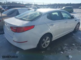 2015 Kia Optima LX with VIN KNAGM4A71F5580809, listed as a IAAI auction lot 41393706 with 106,389 mi miles. Bid and sale history available at carsss.com. Image 4.