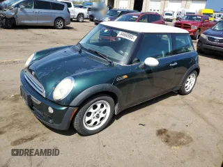 2006 MINI Hardtop with VIN WMWRC33546TK15957, listed as a Copart auction lot 54660995 with 100,893 mi miles and Clean Title. Bid and sale history available at DreamBid. Image 1.