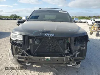 2015 Jeep Grand Cherokee Overland with VIN 1C4RJFCG6FC919637, listed as a Copart auction lot 52072925 with 111,552 mi miles and Salvage Title. Bid and sale history available at carsss.com. Image 5.