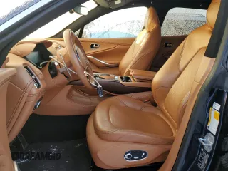 2021 Aston Martin DBX z VIN SCFVUJAW9MTV02708, wystawiony jako Copart lot #85731374 z przebiegiem Nie podano mil oraz Szkoda całkowita • Salvage title. Historia ofert i sprzedaży dostępna na DreamBid. Obrazek 7.