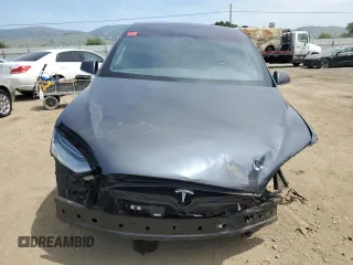 2017 Tesla Model X 90D z VIN 5YJXCDE21HF056145, wystawiony jako Copart lot #55128995 z przebiegiem 86 314 mil mil oraz Szkody całkowita. Historia ofert i sprzedaży dostępna na DreamBid. Obrazek 5.