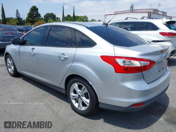 2014 Ford Focus SE with VIN 1FADP3F22EL185266, listed as a IAAI auction lot 42168142 with 177,283 mi miles and . Bid and sale history available at carsss.com. Image 3.