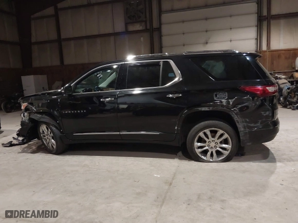 2021 Chevrolet Traverse High Country with VIN 1GNEVNKW9MJ150993, listed as a IAAI auction lot 41224329 with 100,425 mi miles. Bid and sale history available at carsss.com. Image 15.