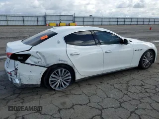 2015 Maserati Ghibli S Q4 with VIN ZAM57RTAXF1150142, listed as a Copart auction lot 39860754 with 56,483 mi miles. Bid and sale history available at carsss.com. Image 3.