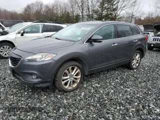 2013 Mazda CX-9 Grand Touring z VIN JM3TB3DV0D0401639, wystawiony jako Copart lot #52300985 z przebiegiem 131 857 mil mil oraz Czysty tytuł • Clean title. Historia ofert i sprzedaży dostępna na DreamBid. Obrazek 1.