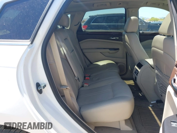 2013 Cadillac SRX Luxury Collection with VIN 3GYFNCE38DS580168, listed as a IAAI auction lot 42122314 with 136,814 mi miles. Bid and sale history available at carsss.com. Image 8.
