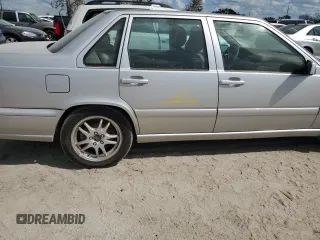 2000 Volvo S70 z VIN YV1LS56DXY2671099, wystawiony jako Copart lot #75080174 z przebiegiem Nie podano mil oraz Nie do naprawy. Historia ofert i sprzedaży dostępna na DreamBid. Obrazek 12.