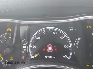 2018 Jeep Grand Cherokee Laredo E with VIN 1C4RJFAG1JC499457, listed as a IAAI auction lot 41379459 with 127,344 mi miles and . Bid and sale history available at DreamBid. Image 16.