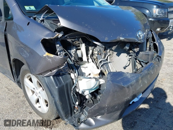 2012 Toyota Sienna with VIN 5TDZK3DC4CS228916, listed as a IAAI auction lot 41936870 with 188,227 mi miles. Bid and sale history available at carsss.com. Image 20.
