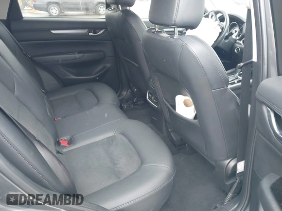 2021 Mazda CX-5 Touring with VIN JM3KFBCM8M0311433, listed as a IAAI auction lot 40554094 with 23,319 mi miles. Bid and sale history available at carsss.com. Image 8.