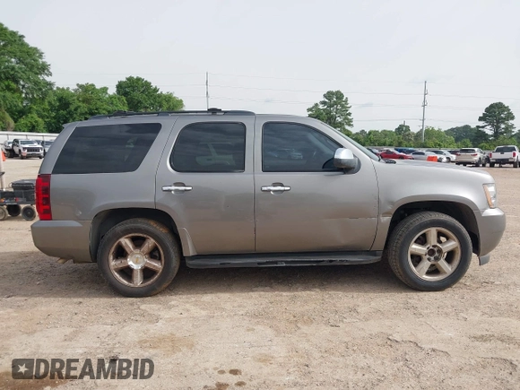 2007 Chevrolet Tahoe LT z VIN 1GNFC13007J351246, wystawiony jako IAAI lot #42270462 z przebiegiem 251 349 mil mil oraz . Historia ofert i sprzedaży dostępna na DreamBid. Obrazek 6.