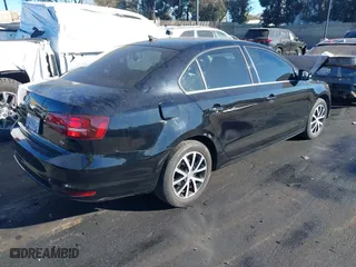 2018 Volkswagen Jetta 1.4T SE with VIN 3VWDB7AJ8JM211535, listed as a IAAI auction lot 41231317 with 68,316 mi miles. Bid and sale history available at carsss.com. Image 4.