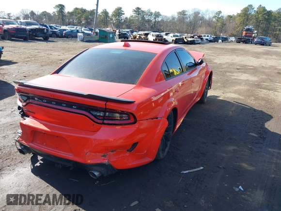 2023 Dodge Charger Scat Pack Widebody with VIN 2C3CDXGJ4PH670928, listed as a IAAI auction lot 41492124 with 64 mi miles and . Bid and sale history available at DreamBid. Image 4.