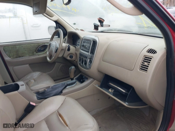 2005 Ford Escape Limited with VIN 1FMYU94155KA52665, listed as a IAAI auction lot 41736416 with 999,999 mi miles. Bid and sale history available at carsss.com. Image 5.