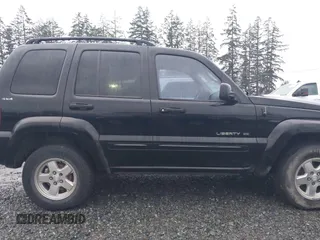 2002 Jeep Liberty Limited with VIN 1J8GL58KX2W198975, listed as a IAAI auction lot 41200746 with 220,079 mi miles and . Bid and sale history available at DreamBid. Image 13.