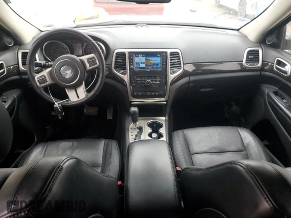 2012 Jeep Grand Cherokee Laredo with VIN 1C4RJFAT9CC354022, listed as a Copart auction lot 50059855 with 205,541 mi miles and Salvage Title. Bid and sale history available at carsss.com. Image 8.