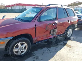 2004 Hyundai Santa Fe GLS with VIN KM8SC13EX4U798868, listed as a IAAI auction lot 41835652 with 222,350 mi miles. Bid and sale history available at carsss.com. Image 6.