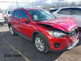 2014 Mazda CX-5 Grand Touring with VIN JM3KE2DY8E0373064, listed as a IAAI auction lot 41683791 with 186,970 mi miles. Bid and sale history available at carsss.com. Image 1.