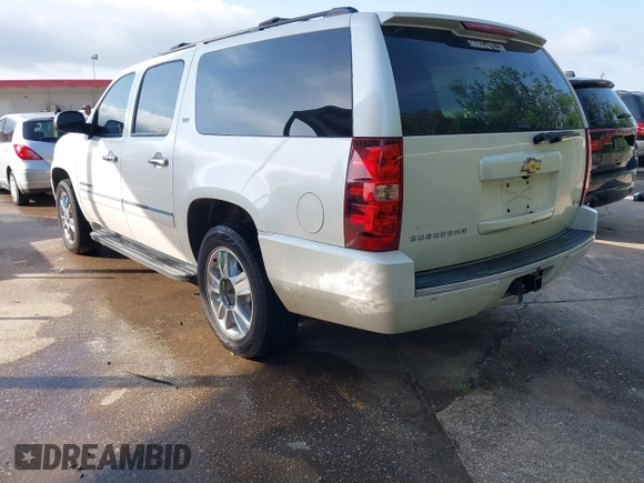 2010 Chevrolet Suburban LTZ with VIN 1GNUKKE38AR251895, listed as a IAAI auction lot 42020123 with 166,130 mi miles. Bid and sale history available at carsss.com. Image 3.