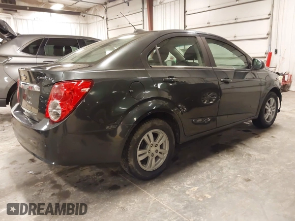 2015 Chevrolet Sonic LT with VIN 1G1JC5SH4F4163515, listed as a IAAI auction lot 41962147 with 133,104 mi miles and . Bid and sale history available at DreamBid. Image 4.