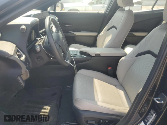 2023 Lexus UX 250h Premium с VIN JTHP9JBHXP2070096, выставлен на аукционе Copart как лот 65645035 с пробегом 9 748 миль миль и Списание • Salvage title. История ставок и продаж доступна на DreamBid. Изображение 7.