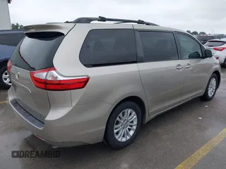2015 Toyota Sienna XLE with VIN 5TDYK3DCXFS578888, listed as a IAAI auction lot 42187384 with 105,287 mi miles and . Bid and sale history available at DreamBid. Image 4.