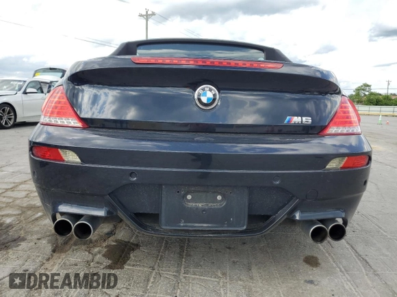 2009 BMW 6 Series M6 z VIN WBSEK93599CY80065, wystawiony jako Copart lot #55277505 z przebiegiem 125 557 mil mil oraz Tytuł czysty. Historia ofert i sprzedaży dostępna na DreamBid. Obrazek 6.