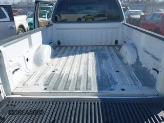 1999 Ford F-150 XL with VIN 1FTRX18L3XKB33860, listed as a IAAI auction lot 41664761 with 305,767 mi miles. Bid and sale history available at carsss.com. Image 12.