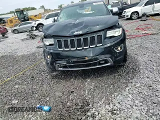 2015 Jeep Grand Cherokee Overland с VIN 1C4RJECG9FC620315, выставлен на аукционе Copart как лот 54569845 с пробегом 219 905 миль миль и Списание • Salvage title. История ставок и продаж доступна на DreamBid. Изображение 14.