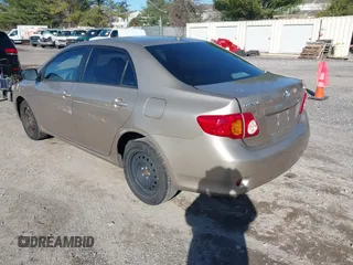 2009 Toyota Corolla with VIN 1NXBU40E69Z003339, listed as a IAAI auction lot 41830174 with 251,354 mi miles. Bid and sale history available at carsss.com. Image 3.
