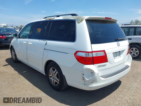 2007 Honda Odyssey EX with VIN 5FNRL38487B075936, listed as a IAAI auction lot 42052061 with 188,279 mi miles and . Bid and sale history available at DreamBid. Image 6.