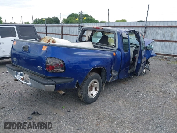 1998 Ford F-150 XL with VIN 2FTZX0722WCA65198, listed as a IAAI auction lot 42145451 with 188,529 mi miles and . Bid and sale history available at DreamBid. Image 4.