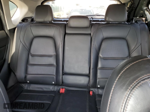 2021 Mazda CX-5 Grand Touring with VIN JM3KFBDM3M1344784, listed as a Copart auction lot 58051445 with 69,593 mi miles and Salvage title. Bid and sale history available at DreamBid. Image 10.