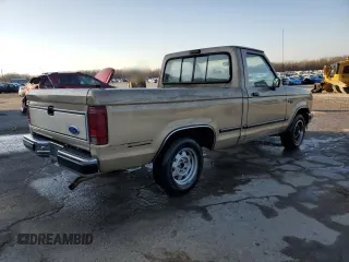1989 Ford Ranger XL with VIN 1FTCR10AXKUC35082, listed as a Copart auction lot 42209825 with 754,095 mi miles and Salvage title. Bid and sale history available at DreamBid. Image 3.