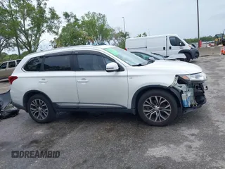 2016 Mitsubishi Outlander GT z VIN JA4JZ4AX1GZ012333, wystawiony jako IAAI lot #42186100 z przebiegiem 163 306 mil mil oraz . Historia ofert i sprzedaży dostępna na DreamBid. Obrazek 14.