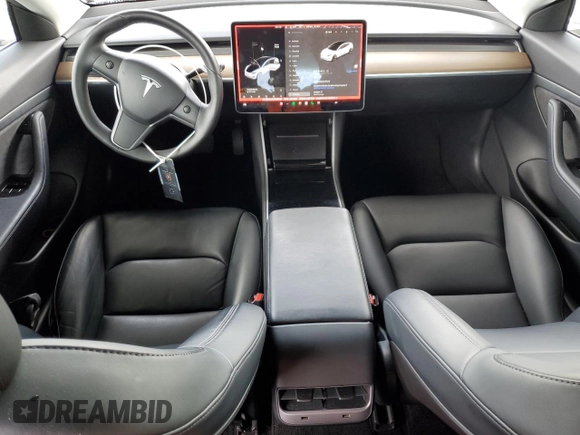 2020 Tesla Model 3 Standard Range Plus with VIN 5YJ3E1EA1LF631139, listed as a Copart auction lot 49161805 with 58,140 mi miles and Salvage Title. Bid and sale history available at DreamBid. Image 8.