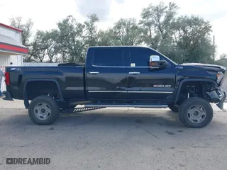 2015 GMC Sierra 2500HD SLT with VIN 1GT12ZE87FF552599, listed as a IAAI auction lot 40054977 with 146,190 mi miles. Bid and sale history available at carsss.com. Image 12.
