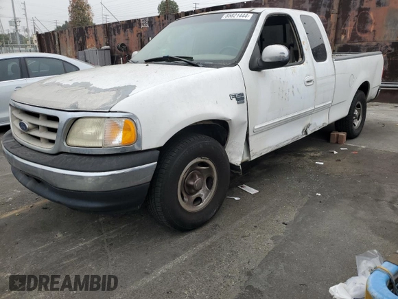 2000 Ford F-150 XL with VIN 1FTRX17L5YKA74815, listed as a Copart auction lot 85821444 with 0 mi miles and Salvage Title. Bid and sale history available at carsss.com. Image 1.