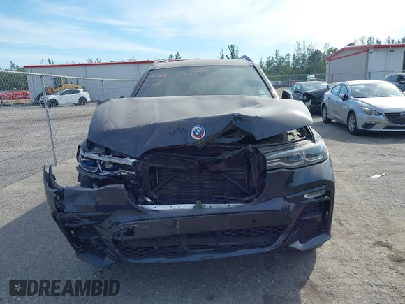 2022 BMW X7 M50i z VIN 5UXCX6C08N9M15818, wystawiony jako IAAI lot #41434065 z przebiegiem 52 740 mil mil oraz . Historia ofert i sprzedaży dostępna na DreamBid. Obrazek 12.