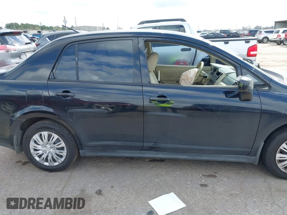 2009 Nissan Versa 1.8 S with VIN 3N1BC11E09L450167, listed as a IAAI auction lot 41711284 with 91,216 mi miles. Bid and sale history available at carsss.com. Image 13.