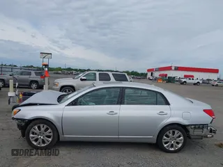 2010 Toyota Avalon XL with VIN 4T1BK3DB6AU369581, listed as a IAAI auction lot 42159063 with 137,996 mi miles and . Bid and sale history available at carsss.com. Image 21.