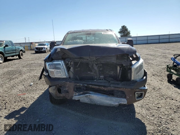 2017 Nissan Titan Pro-4X z VIN 1N6BA1F42HN530830, wystawiony jako Copart lot #63860384 z przebiegiem 317 812 mil mil oraz Szkoda całkowita • Salvage title. Historia ofert i sprzedaży dostępna na DreamBid. Obrazek 5.