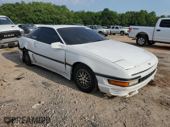 1990 Ford Probe GL z VIN 1ZVPT20CXL5212307, wystawiony jako Copart lot #54941994 z przebiegiem 241 227 mil mil oraz Szkoda całkowita • Salvage title. Historia ofert i sprzedaży dostępna na DreamBid. Obrazek 4.