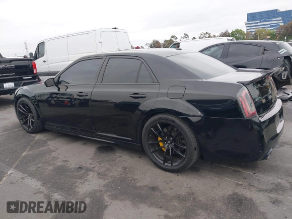 2013 Chrysler 300 SRT-8 with VIN 2C3CCAFJ9DH576184, listed as a IAAI auction lot 42162364 with 104,021 mi miles and . Bid and sale history available at carsss.com. Image 15.