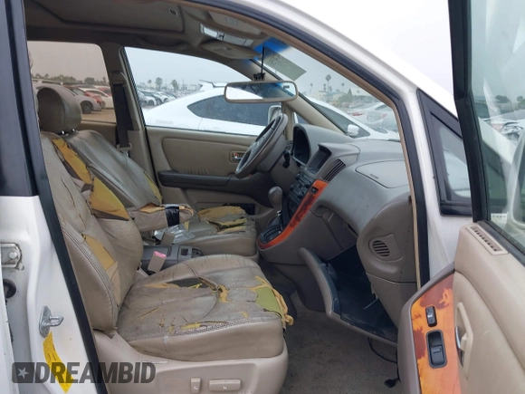 2001 Lexus RX 300 with VIN JTJGF10U010092702, listed as a IAAI auction lot 42489593 with 215,966 mi miles and . Bid and sale history available at DreamBid. Image 5.