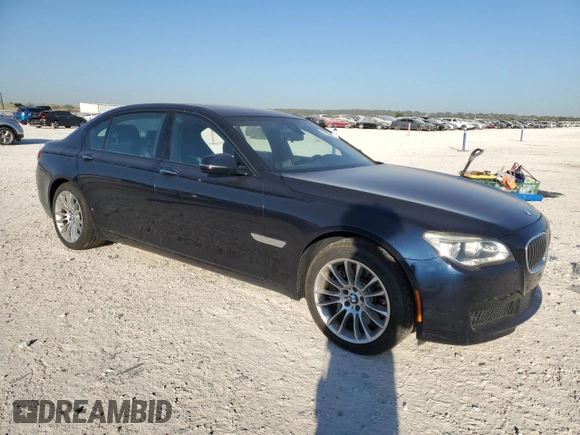 2015 BMW 7 Series 750Li with VIN WBAYE8C59FD781318, listed as a Copart auction lot 74053154 with 62,681 mi miles and Salvage Title. Bid and sale history available at carsss.com. Image 4.