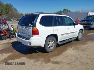 2002 GMC Envoy SLT with VIN 1GKDS13S622507379, listed as a IAAI auction lot 41641163 with 201,089 mi miles. Bid and sale history available at carsss.com. Image 4.