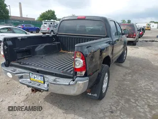 2013 Toyota Tacoma with VIN 3TMLU4EN5DM107500, listed as a IAAI auction lot 42733914 with Not provided miles and . Bid and sale history available at DreamBid. Image 4.