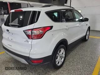 2018 Ford Escape SE z VIN 1FMCU9GD3JUC89119, wystawiony jako IAAI lot #42421139 z przebiegiem 42 209 mil mil oraz . Historia ofert i sprzedaży dostępna na DreamBid. Obrazek 15.