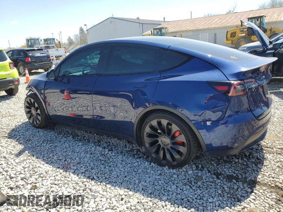 2022 Tesla Model Y Performance z VIN 7SAYGDEF2NF461103, wystawiony jako Copart lot #52198205 z przebiegiem 33 576 mil mil oraz Szkoda całkowita • Salvage title. Historia ofert i sprzedaży dostępna na DreamBid. Obrazek 2.